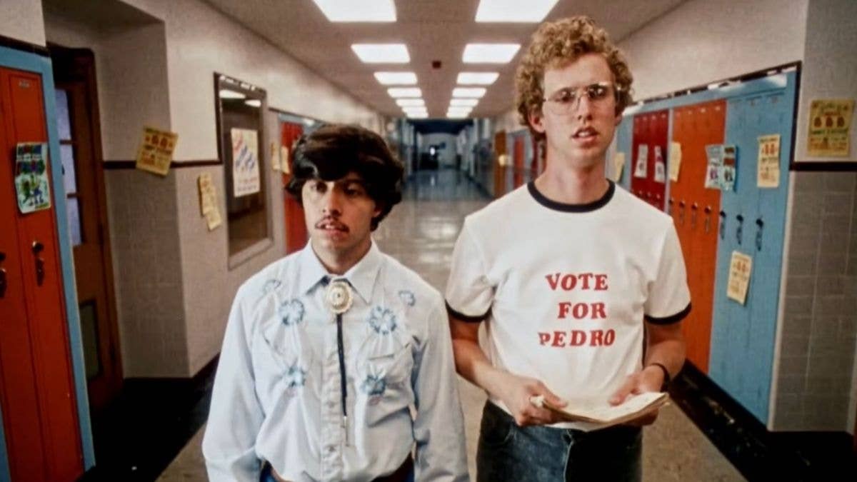 Napoleon and Pedro in a school hallway, Napoleon wearing a “Vote for Pedro” shirt